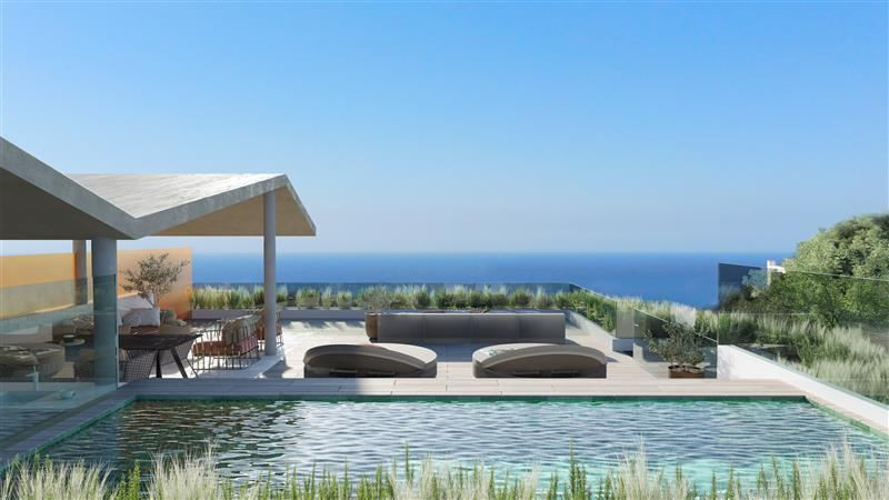 Higueron North Residences – Apartments – Fuengirola - infinity pool terrace with lounge seating and panoramic Mediterranean sea views