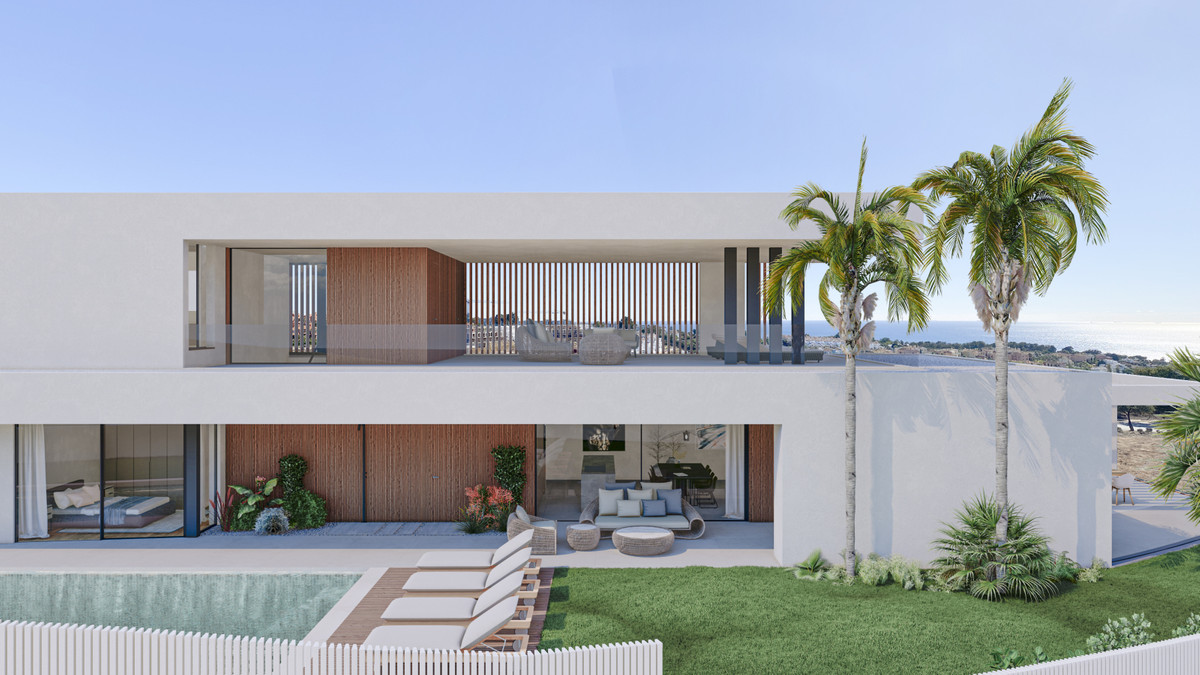 Villa Natalie – Manilva - modern white exterior with pool, sun loungers, terrace, palm trees and sea views
