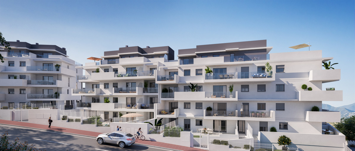 Alonia – Manilva - modern white-render exterior facade with terraces, balconies and mountain backdrop