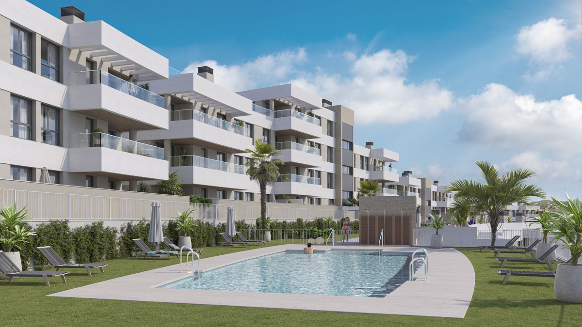 Insur Scala – Estepona - modern apartment complex with communal pool, sun loungers, and palm-lined gardens