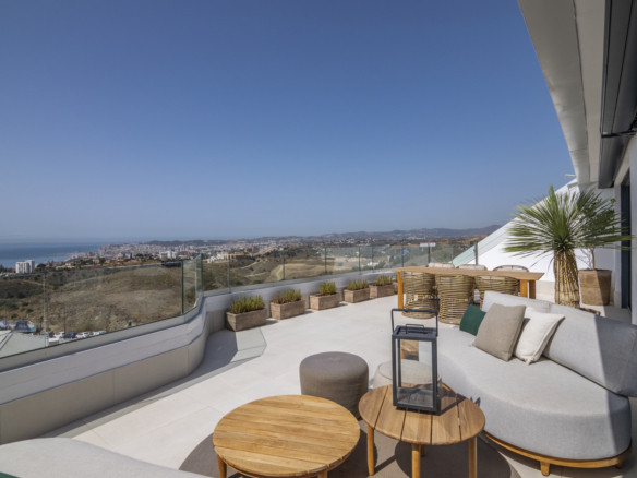Lomas 2 – Fuengirola - luxury terrace with sea and coastal city views, outdoor sofa seating and teak furniture