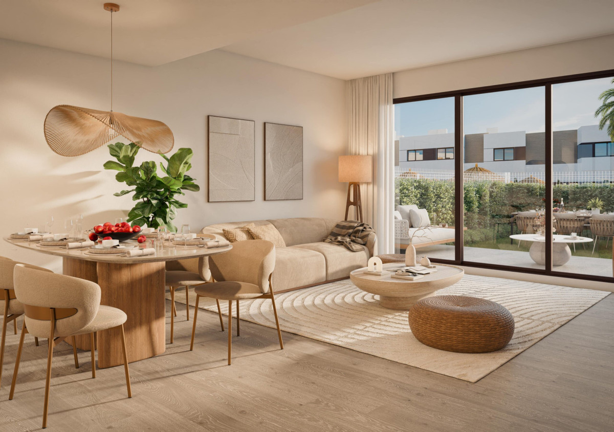 Savia – Fase 2 – Mijas - bright open-plan living and dining area with garden terrace access and warm neutral tones