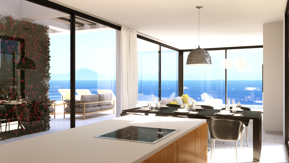 Stupa – Villa Shanti – Mijas Golf - open-plan kitchen and dining area with panoramic sea views through floor-to-ceiling glazing
