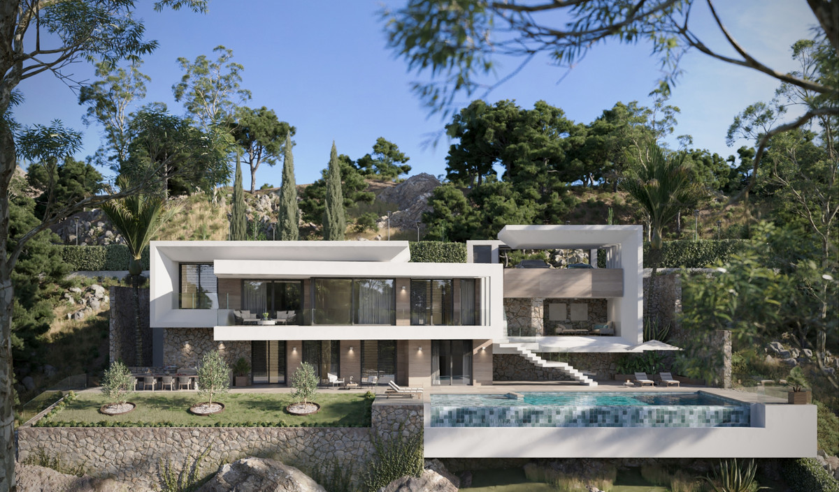 VILLA EVANIA Selwo – Estepona - modern white villa exterior with infinity pool, terraced gardens and hillside backdrop