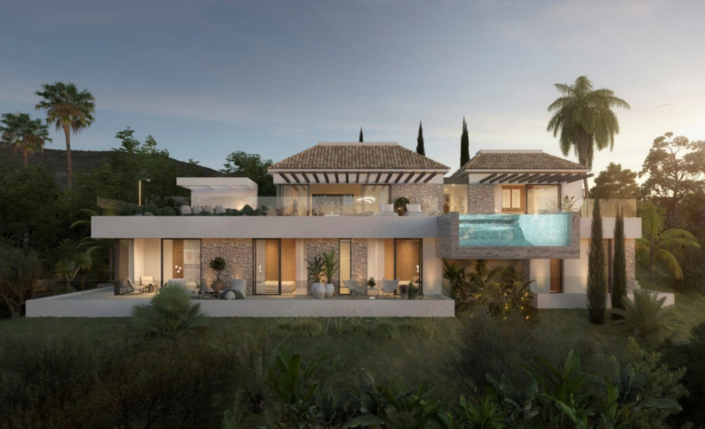 Villa ALHAMA de La Reserva – San Roque - luxury exterior facade with elevated infinity pool, stone cladding, and tropical landscaping at dusk