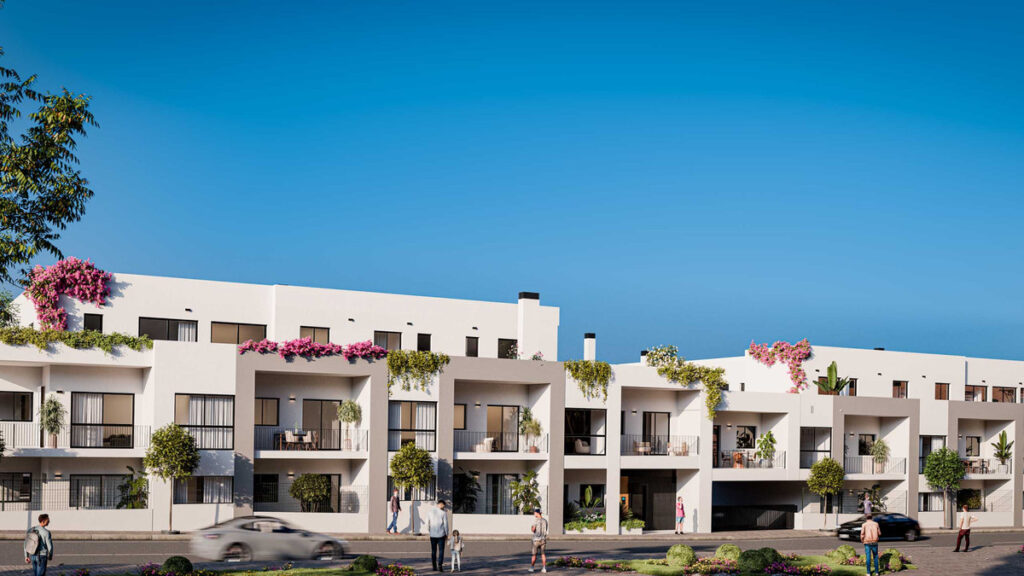 Olivara Living FASE II – Alhaurín de la Torre - white modern residential facade with balconies, lush greenery and bougainvillea under blue sky