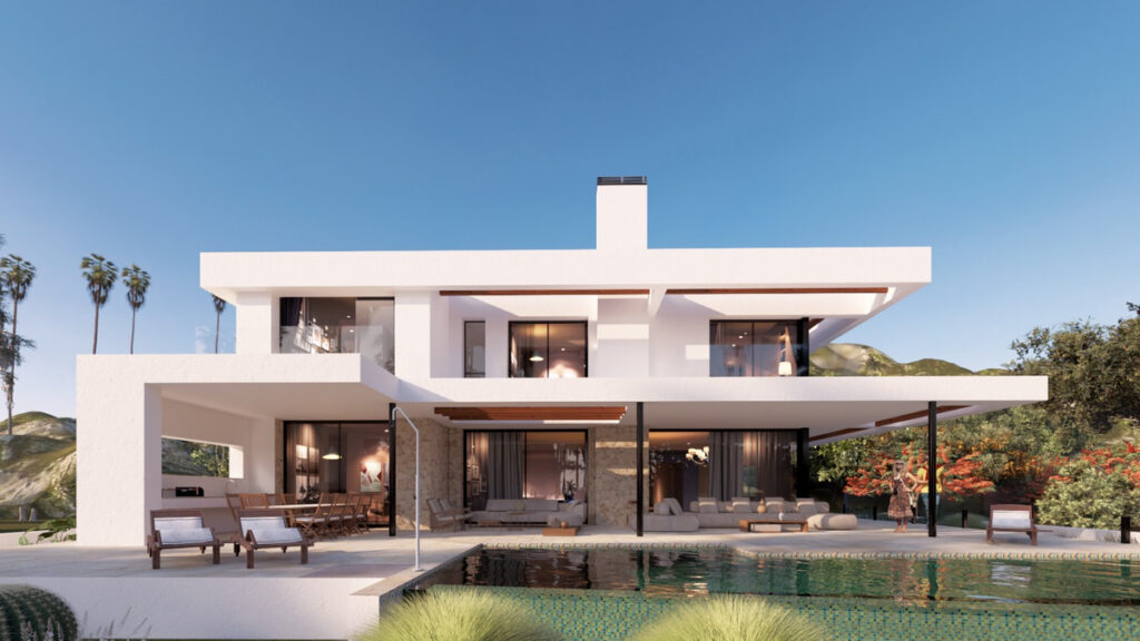 Villa 22 – El Chaparral Bespoke Villa' – Mijas - modern white exterior facade with infinity pool, terraces and mountain backdrop