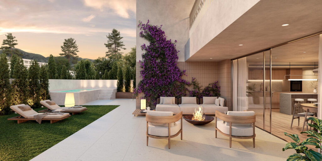 Art Marine – La Carihuela - luxury terrace with fire pit, outdoor seating, pool, and bougainvillea wall at dusk