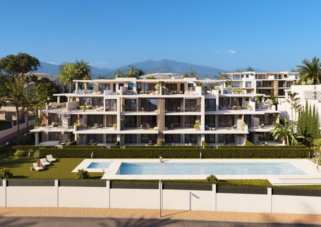 Royal Park Residence – PHASE 2 – New Golden Mile - luxury exterior facade with communal pool, landscaped gardens and mountain backdrop