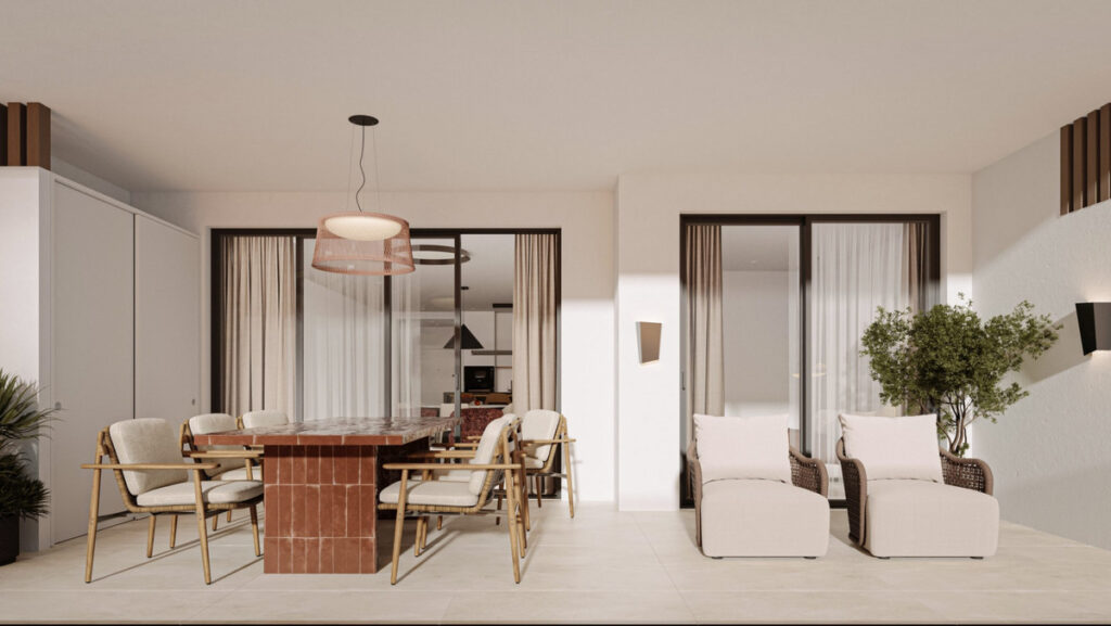 Royal Park Residence – PHASE 2 – New Golden Mile - open-plan dining and living area with terracotta marble table and rattan chairs