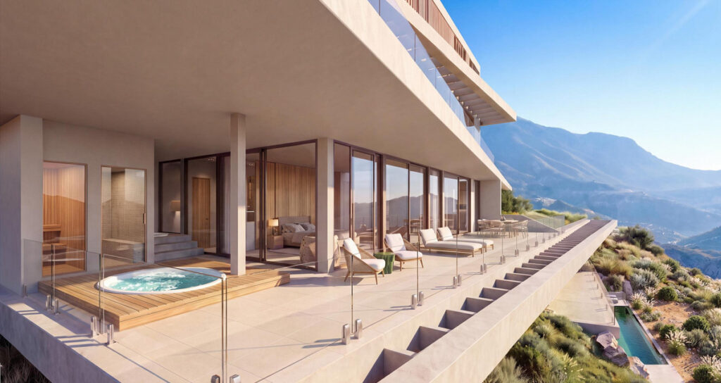 Vitae Villas C10 – Benahavís - luxury terrace with jacuzzi, sun loungers, glass balustrade and mountain views