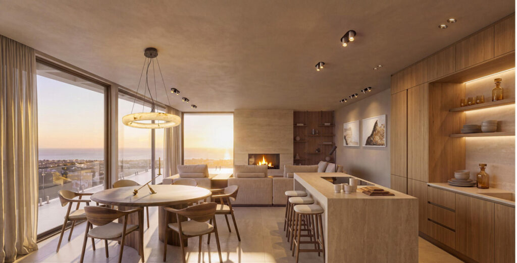 Vitae Villas C10 – Benahavís - open-plan living, dining and kitchen with fireplace and sunset sea views